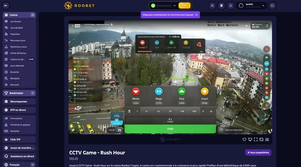 Interface du jeu Rush Hour sur Roobet avec le flux cam&eacute;ra d'une rue de Roumanie, les 4 types de paris Under, Range, Over et Exact affich&eacute;s en bas de l'&eacute;cran.