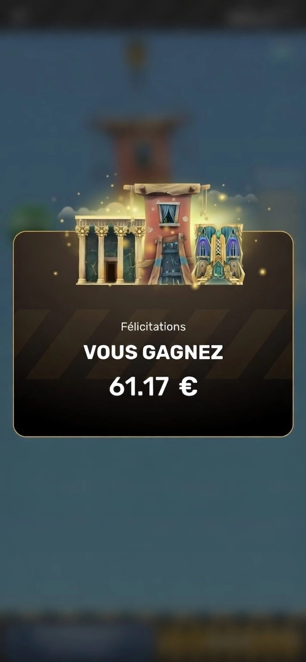 &Eacute;cran du jeu de la tour casino affichant un message de victoire &ldquo;F&eacute;licitations VOUS GAGNEZ 61.17 &euro;&rdquo;, tour construite avec plusieurs &eacute;tages visibles au-dessus, fond flou du jeu en arri&egrave;re-plan, encadr&eacute; noir et dor&eacute; mettant en avant le montant gagn&eacute; apr&egrave;s cashout r&eacute;ussi.